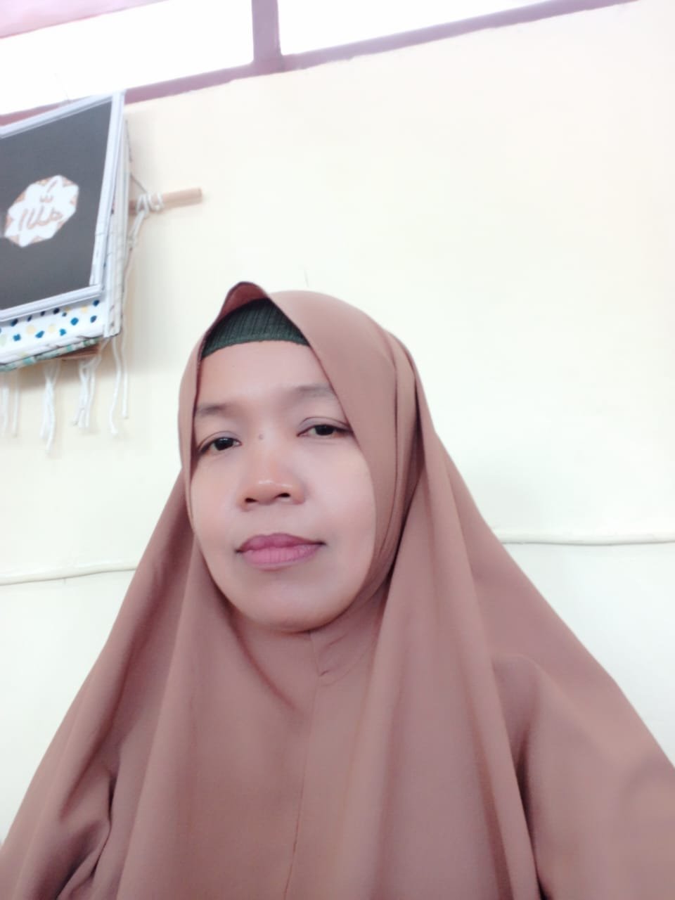 Evi Muliani Safa, S.Pd.